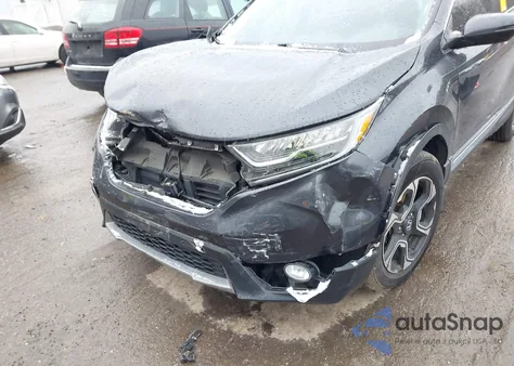 2019 Honda Cr-V Touring z USA, uszkodzony, nr VIN 5J6RW2H99KL016679